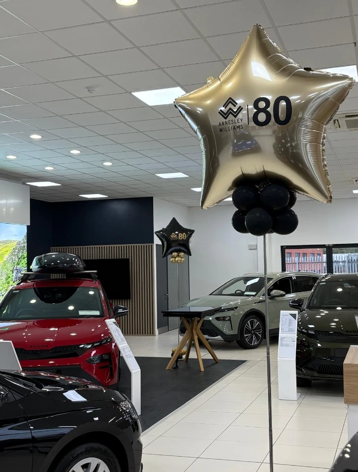 showroom with balloons celebrating over 80 years in business